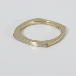 14k gold Ring with a white and yellow gold striped pattern.