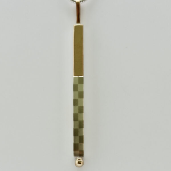 Checkerboard Bar Pendant With 22K and 14K Gold is shown.