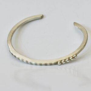 Sterling Striped Cuff is shown.