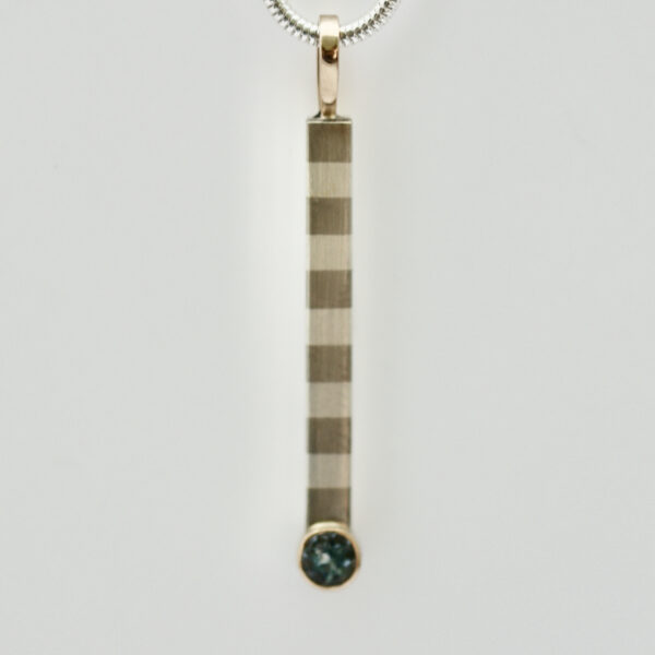 Striped Bar Pendant With and Aquamarine Gemstone is shown.