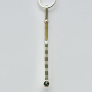 Striped Bar Pendant with Aquamarine and 22k Gold is shown.