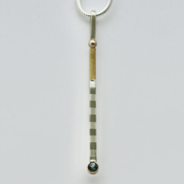 Striped Bar Pendant with Aquamarine and 22k Gold is shown.