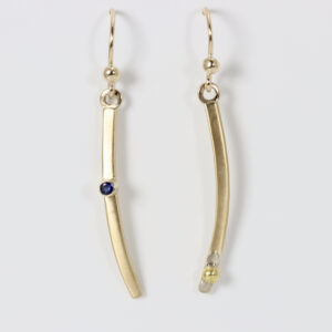 18k Contemporary Dangles. Each earring is unique. One has a sapphire.