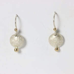 Sterling silver textured dangling disc earrings with 14k gold balls.