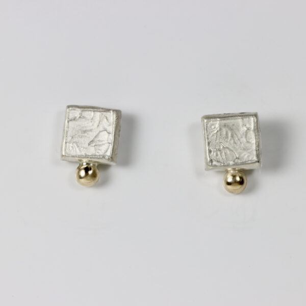 Texture Square Stud in sterling silver, with a 14k gold ball.