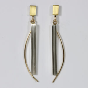 Contemporary mixed metal earrings. Hand fabricated in sterling silver, 14k and 22k gold. Details include a subtle vertical striped pattern.