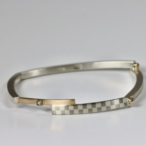 Checkerboard & Gold Bracelet with a Diamond.