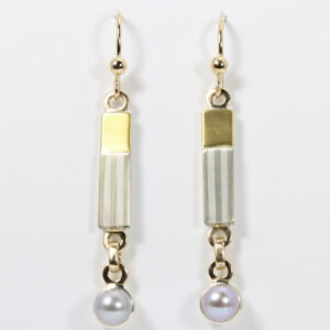 Mixed metal grey pearl earrings with a striped pattern.