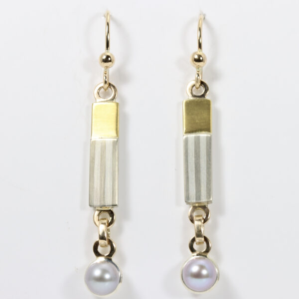 Mixed metal grey pearl earrings with a striped pattern.