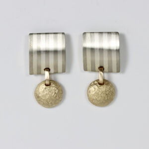 Stripe square shaped post in sterling with a dangling textured 14k disc.