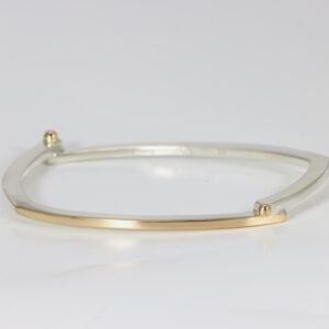 Sterling silver and 14k gold squarish shaped bangle