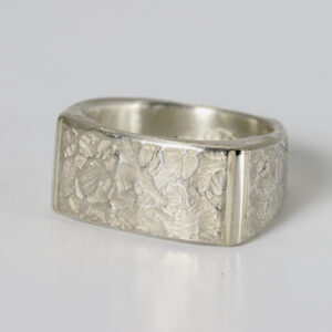 Textured sterling silver ring.