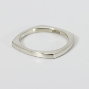 A sterling silver squarish shaped ring.