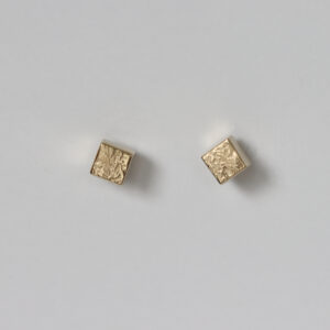 Textured and smooth 14k cube studs.