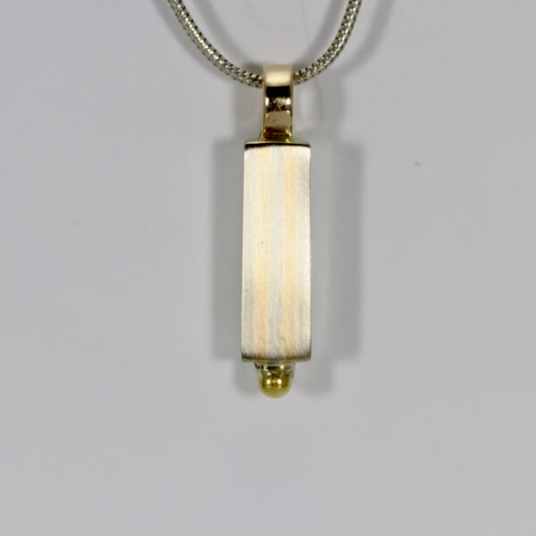 Rectangular Pendant with a white and yellow gold striped pattern.