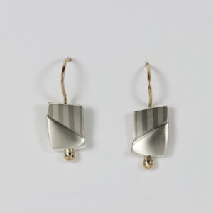 Striped and smooth earrings with a 14k gold ball ear wire.
