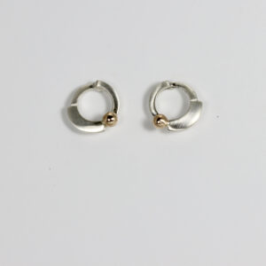 Open circular sterling silver post earrings with a 14k ball.