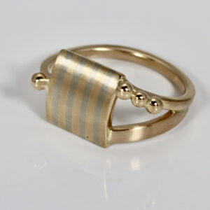 White & Yellow Gold Striped Ring with solid gold ball detail. The ring is hand fabricated in 14k gold.