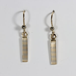 Dangles earrings hand-fabricated in 14k white and yellow gold with subtle striped pattern.