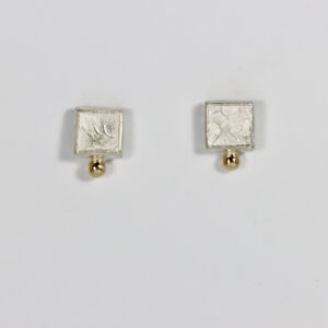 Textured square stud in sterling silver with a solid 14k gold ball.