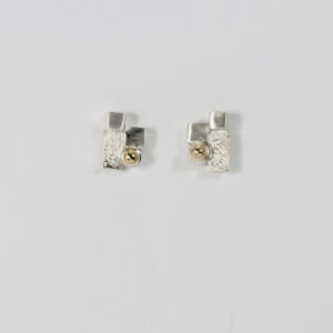 Architectural stud earring in sterling silver with a solid 14k gold ball.