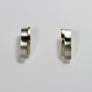 Sterling silver striped post style earrings with contrasting 14k yellow gold.